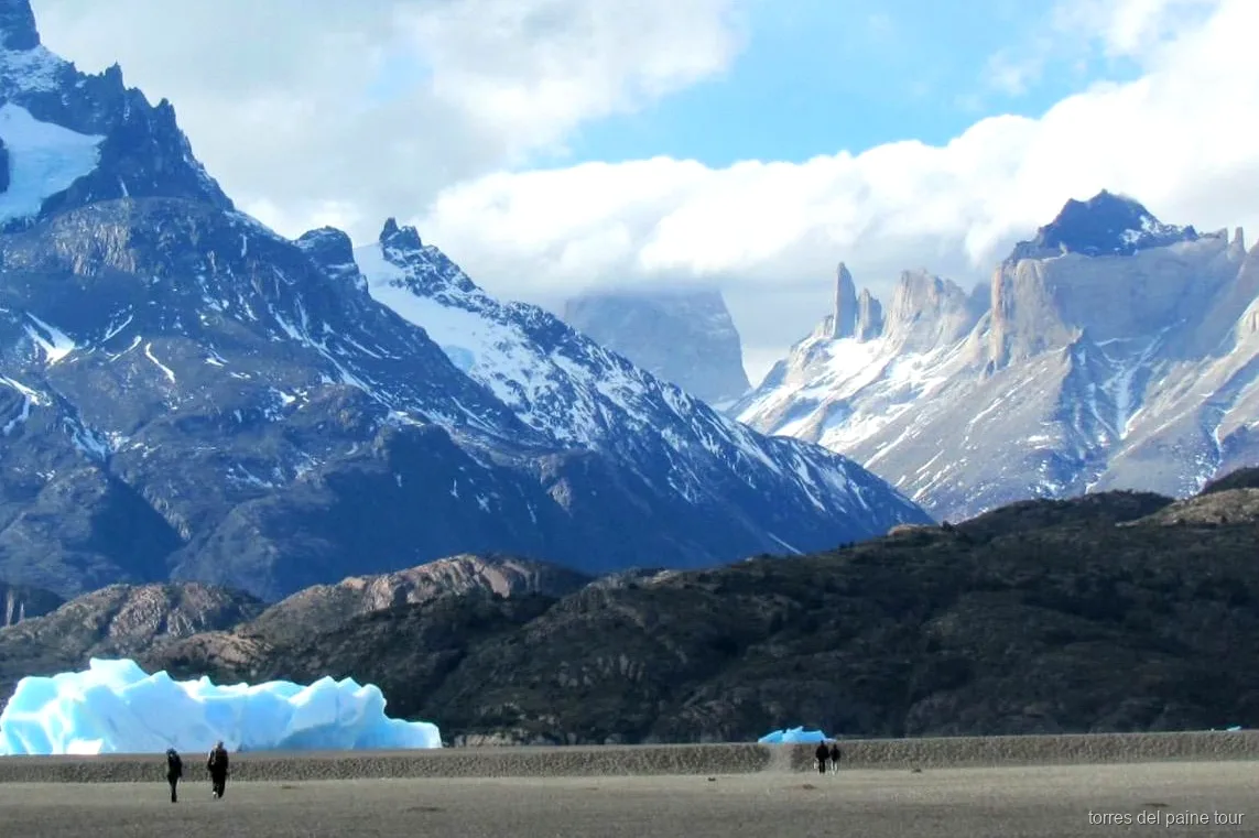 Beach walk along Lake Grey before boarding the Torres del Paine catamaran