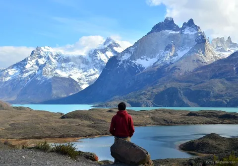 Horseback rider crossing open steppe on the Laguna Azul ride in Torres del Paine