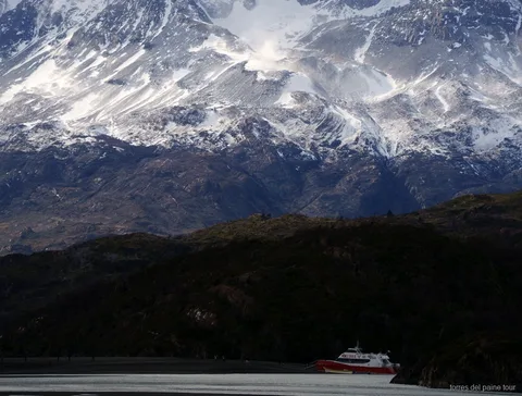 Grey Lake beach with floating icebergs during the Torres del Paine full-day tour