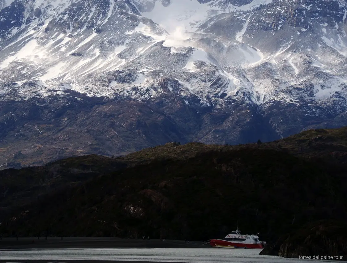 Grey Lake beach with floating icebergs during the Torres del Paine full-day tour